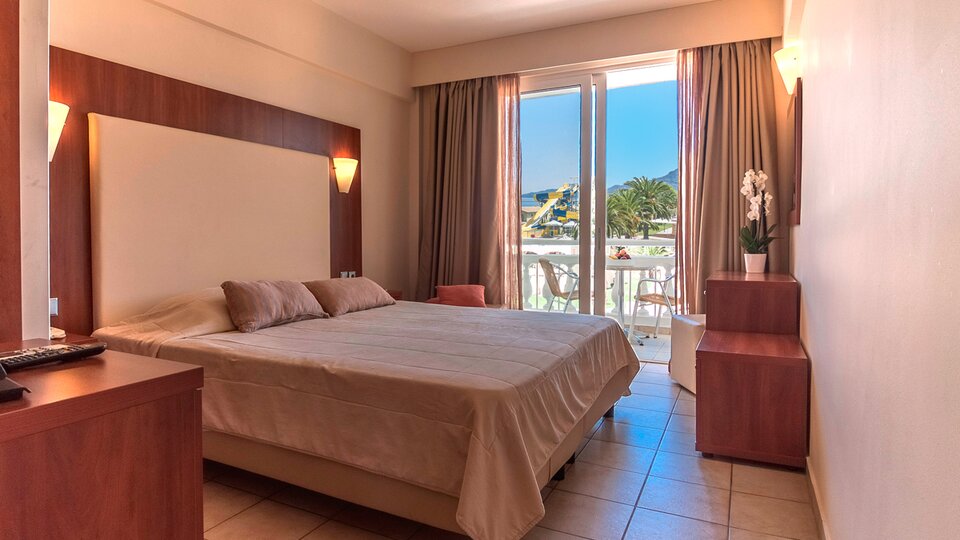 Tiara Holidays - Canvas by Mitsis Messonghi - standard room garden view - bedroom
